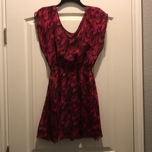 Flattering dress. Gathers in the middle and flares